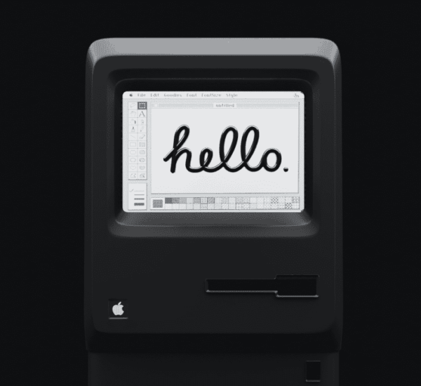 Ancien ordinateur Mac avec écrit "hello"